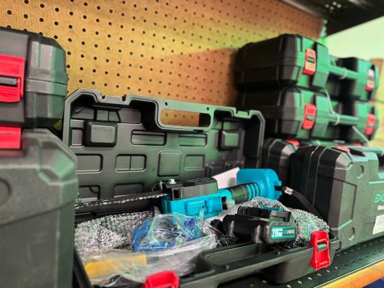 Power tool cases and hardware on the shelf