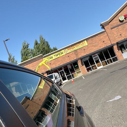 The Mega Outlet storefront from the parking lot